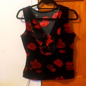 Sleeveless top and skirt with splits and flower pattern